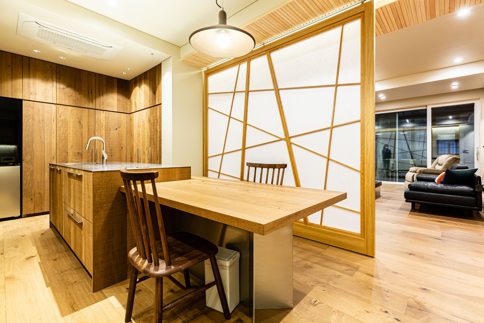 Kitchen and dining area with wood partition
